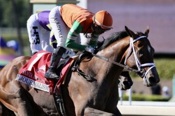 Journalism winning the 2025 Santa Anita Derby (G1) at Santa Anita