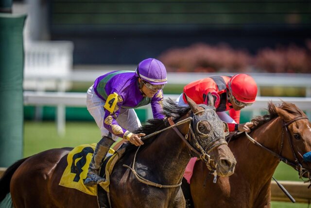 man racing horse