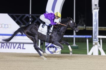 Six Speed shown winning the Guineas Trial in the silks of his former owners (Photo by Dubai Racing Club)