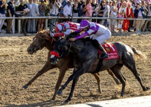 Emerging Market wins the Louisiana Derby at Fair Grounds.