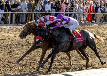 Emerging Market wins the Louisiana Derby at Fair Grounds.
