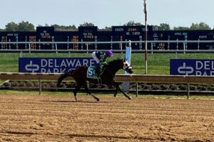 Jumping the Gun wins the Small Wonder Stakes at Delaware Park. 