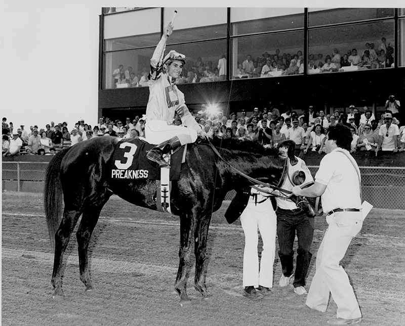 Jockey Alex Solis celebrates after Snow Chief's victory in the 1986 Preakness (G1)